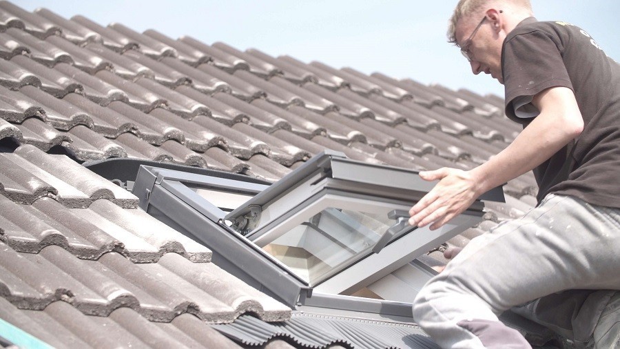 Checking a skylight window for the cause of a leak