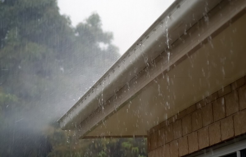 Roof guttering in rain