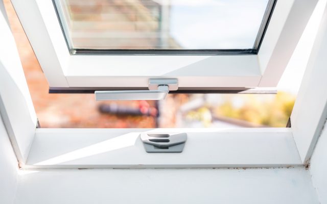 Close up interior of a Dakea roof window, slightly opened.