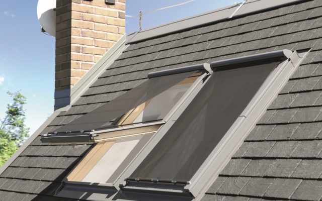An external shot of a roof, with Dakea anti-heat blinds working to prevent the warmth from entering the home.