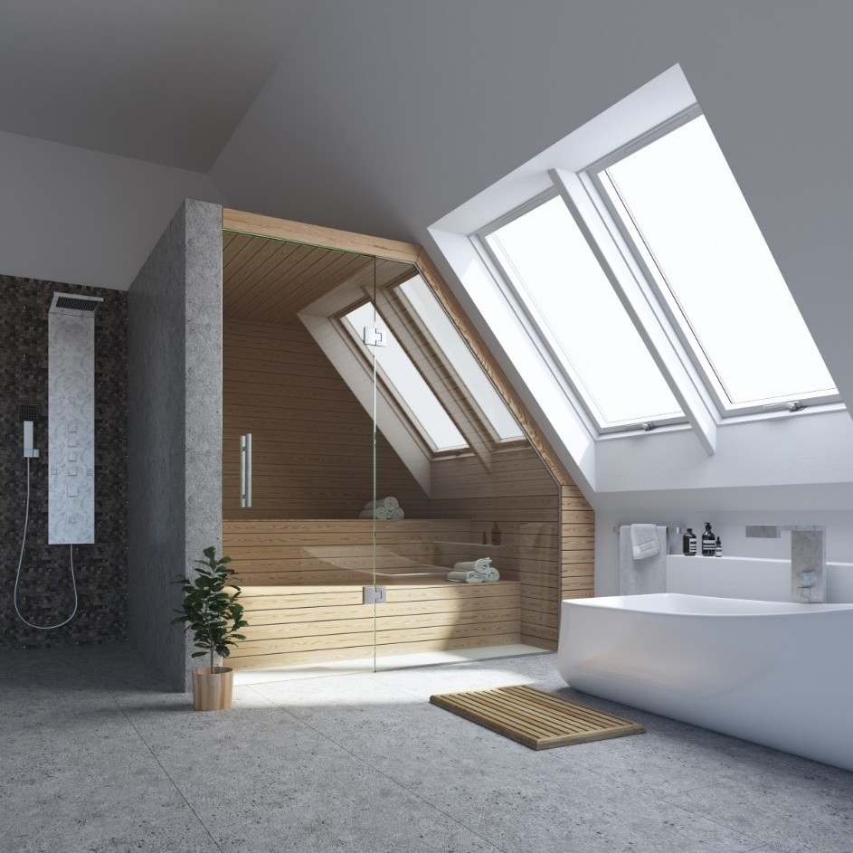 Modern and airy bathroom interior with large roof windows.