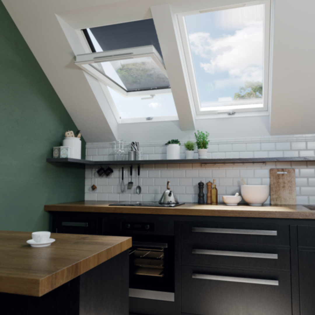 Loft conversion kitchen with open roof window