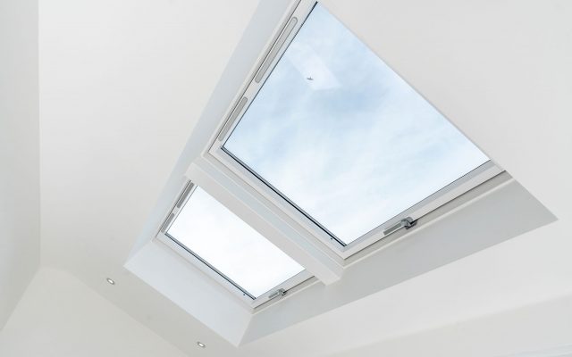 Two Dakea pitched roof windows installed on a roof.