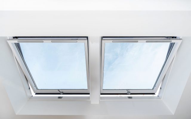 Two Dakea pitched roof windows opened in a loft space.